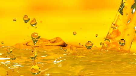 Pouring oil car motor gold color selective focus, 3d render.の写真素材