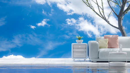 Blue Sofa with yellow and pink pillow in front blue sky, with plant beside it. Side light shadows the trees. Space for banner and logo background. 3D Render.の写真素材