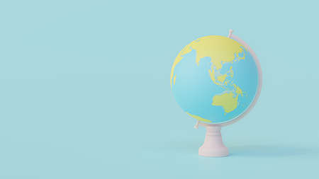 Yellow and blue globe on pink stand. Designed in pastel tones. Space for banner and logo, 3D Render.の写真素材
