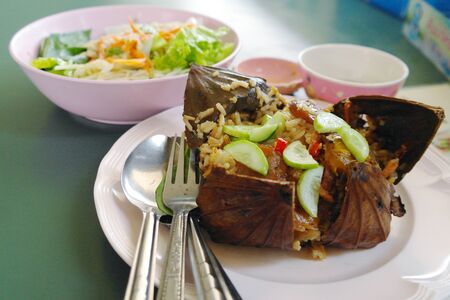 Rice wrapped in lotus leaves at 100 years Market Suphanburi の写真素材