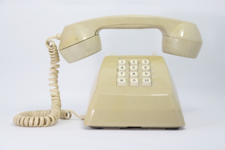 Old phones with earphone floating on airの写真素材