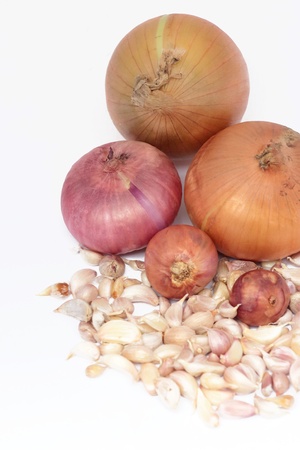 onions and garlic on whiteの写真素材
