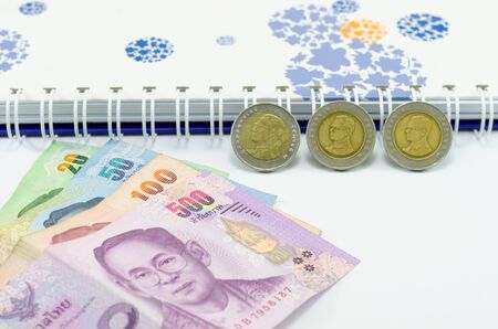 THB Cash , coin with money thailand and notebookの写真素材