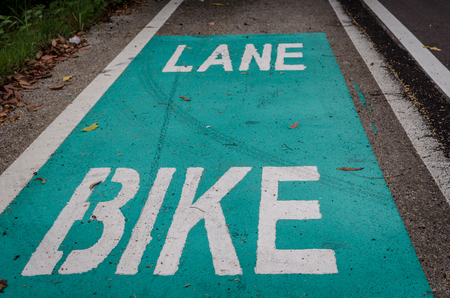 Bicycle road sign on asphalt. Bicycle lane in Thailand.の写真素材