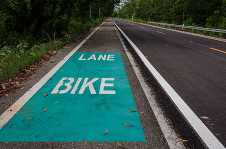 Bicycle road sign on asphalt in Thailand. Bicycle lane.の写真素材