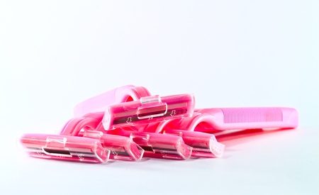 pink razor isolated on white background.の写真素材