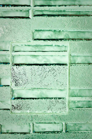 Pattern of Green Modern Brick Wall Surfaced.の写真素材