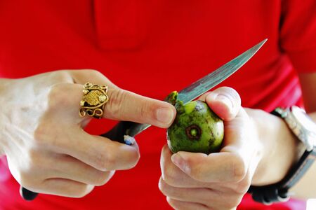 The cook has cut olive. peel olive.の写真素材