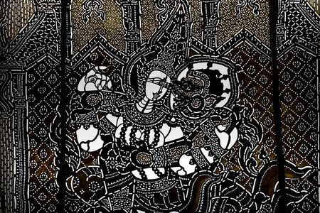 Traditional Thai style engraving leather. Buddha Temple in Thailand.の写真素材