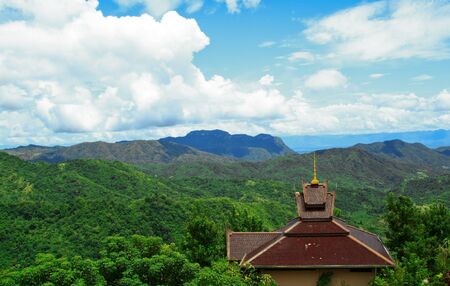 Traditional Thai style Buddhist church temple  in mountainの写真素材