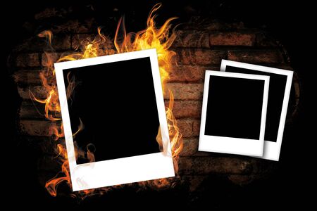 Empty frame with fire on brick black wall  Grunge wall の写真素材
