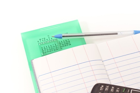 Papers on financial figures with telephone and pen の写真素材