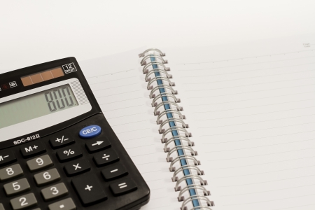 Calculator, press the number to 800 and blank book の写真素材