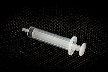 Syringe on black background  Medical syringe の写真素材