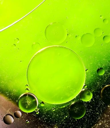 Oil drops on a water surface  Abtract background の写真素材