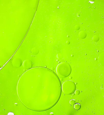 Oil drops on a water surface  Abtract background の写真素材