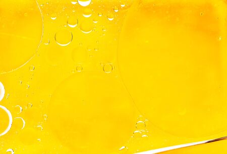 Oil drops on a water surface  Abtract background の写真素材