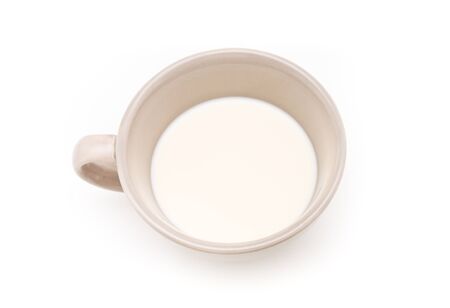 Ceramic cup of milk on white background の写真素材