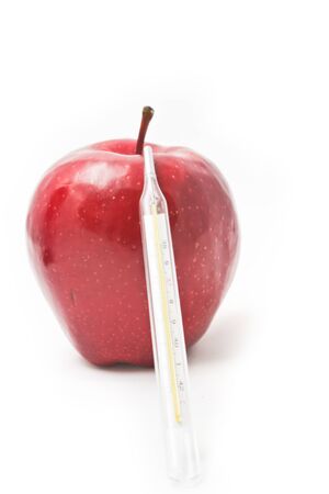Apple and thermometer health care  Concept and idea for health の写真素材