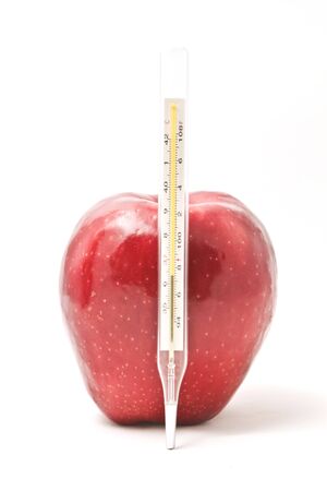Apple and thermometer health care  Concept and idea for health の写真素材