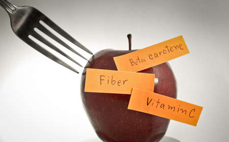 Apple diet concept  Apple wrote a fiber, vitamins, beta-carotene の写真素材