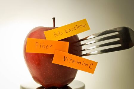 Apple diet concept  Apple wrote a fiber, vitamins, beta-carotene の写真素材