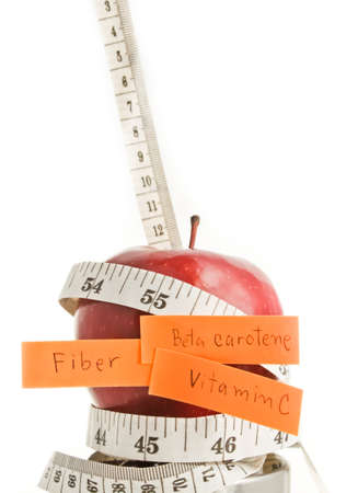 Apple diet concept  Apple wrote a fiber, beta-carotene  Apples were wrapped with tape の写真素材