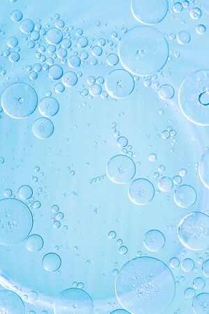 Oil drops on a water surface  Abstract background の写真素材
