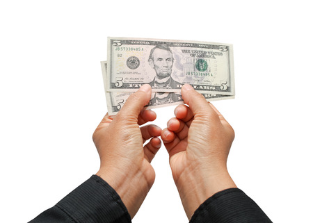 Hand with money isolated on a white .の写真素材