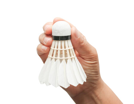 Badminton ball on hand for badminton sport. Isolated on whiteの写真素材