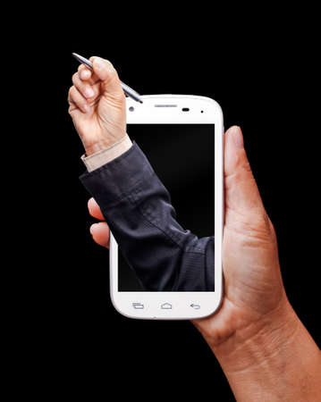 Hand holding white smartphone with  hand writeの写真素材