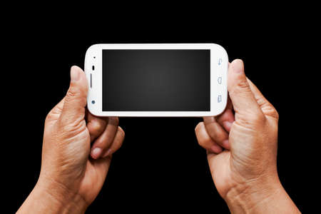 Hand holding white smartphone with blank screen.の写真素材