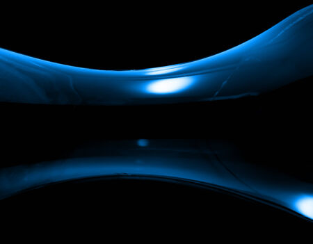 Colorful curve on black background. Curve abstract.の写真素材