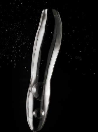 Soap bubble curve on black background.の写真素材