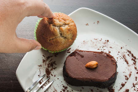 Dessert chocolate cake on a white plate. Eat Banana cake dessert.の写真素材