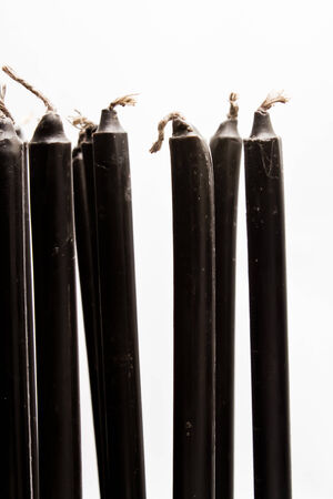 Candle wax black arranged. Candle sticks.の写真素材