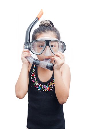 Cute little girl wearing a snorkel mask for diving on white background.の写真素材