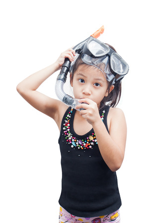 Cute little girl wearing a snorkel mask for diving on white background.の写真素材