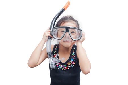 Cute little girl wearing a snorkel mask for diving on white background.の写真素材