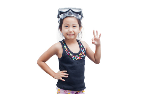 Cute little girl wearing a snorkel mask for diving on white background.の写真素材