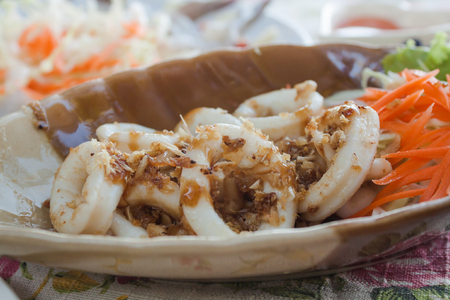 Fried squid with garlic pepper.の写真素材