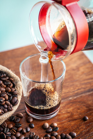 Vintage style coffee, pour black hot coffee.の写真素材