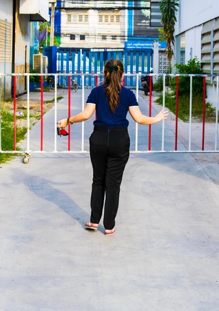Woman turned on street in thailand.