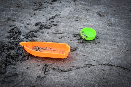 Toys on the beach with blurred background.の写真素材