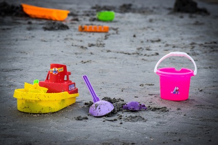 Toys on the beach with blurred background.の写真素材