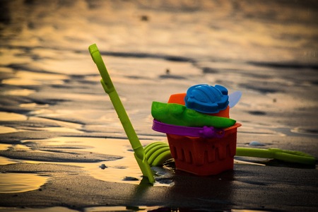 Toys on the beach with blurred background.の写真素材