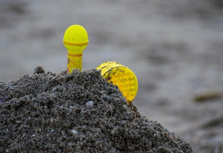 Toys on the beach with blurred background.の写真素材
