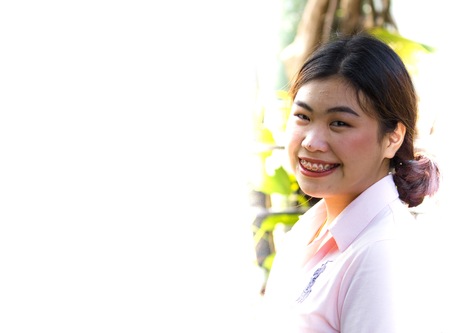 Little girl is smiling on a white background.の写真素材