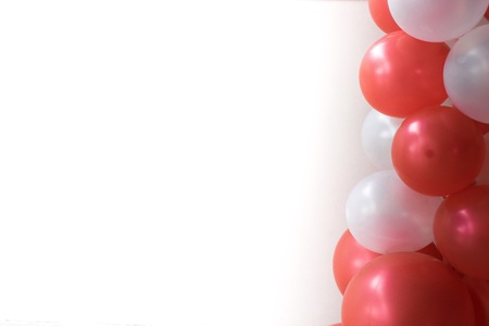 Red balloons on white background used for carnivalの写真素材