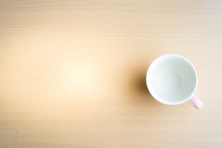Coffee mugs on wooden plates using wallpapers for drinking work.の写真素材
